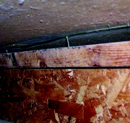 Buckled subfloor from flood water damage
