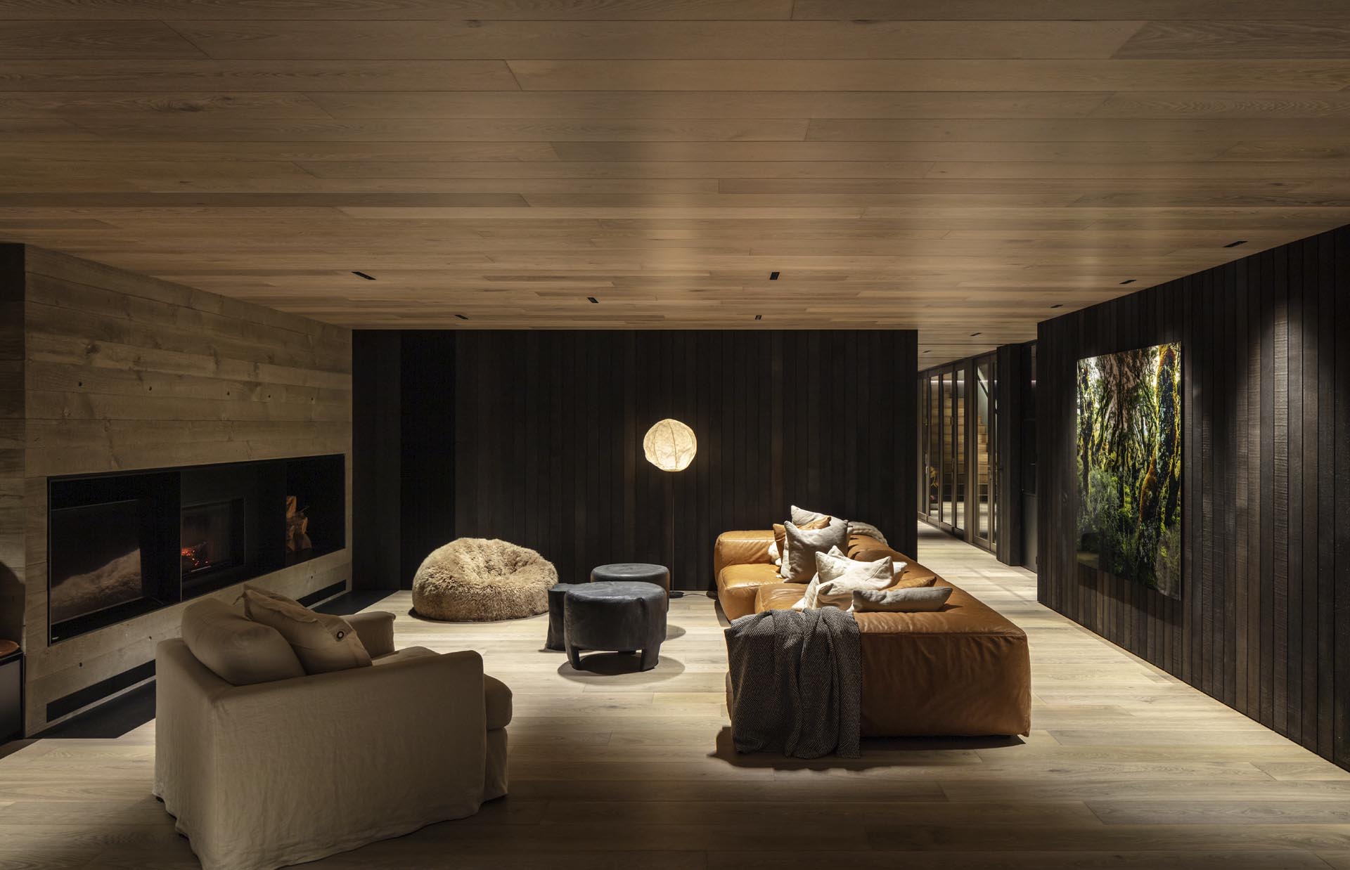 Wooden flooring and wooden panelling on ceiling